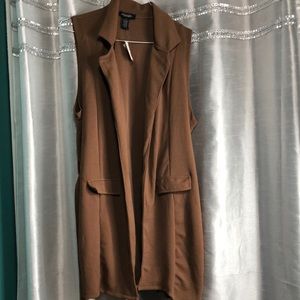 Long vest, purchased at Rainbow clothing store.